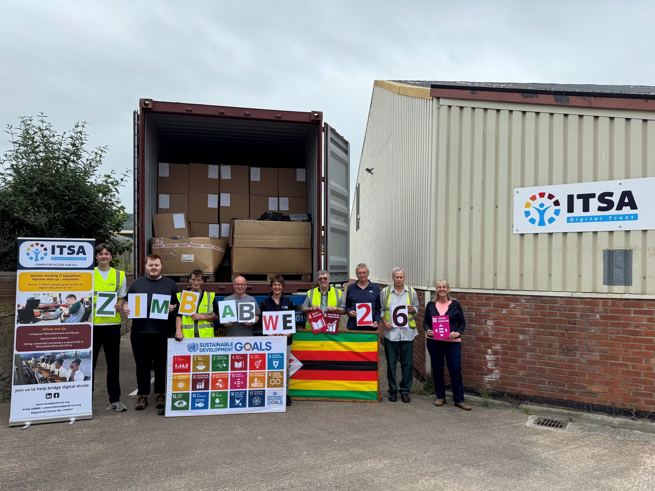 ITSA group photo holding up signs spelling Zimbabwe